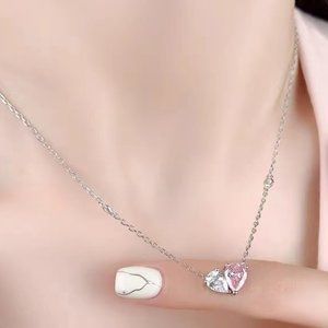 A companion necklace with pink diamonds